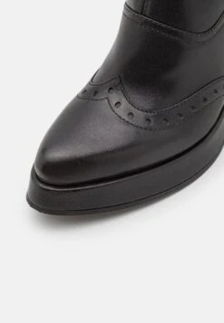 Chie Mihara Fayu - Platform Ankle Boots -Fashion Clothing Store 7d7e049190814094a9298293624de1a7