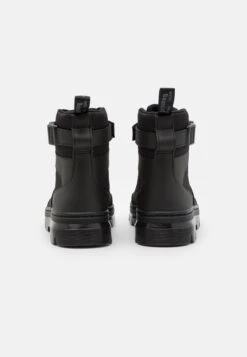 Dr. Martens Combs Tech -8 Eye Boot Unisex - Lace-Up Ankle Boots -Fashion Clothing Store 9f9ca25209f74b6fa32eabe4bf53bce4