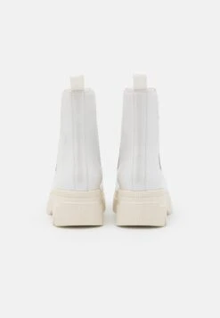 Calvin Klein Jeans Chunky Combat Chelsea Boot - Platform Ankle Boots - White -Fashion Clothing Store a02b3a3c952849c3bbdb29c54e2dfa0d